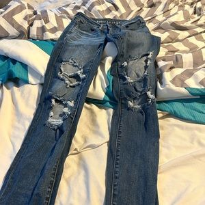 2 pair like new American Eagle skinny jeans size 4